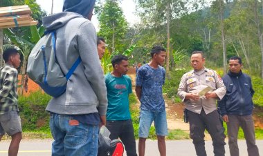 BRIPKA-ALBERTUS-RAHMAT,-Bhabinkamtibmas-Kecamatan-Cibal,-Himbau-Masyarakat-waspada-TPPO-dan-Karhutla.