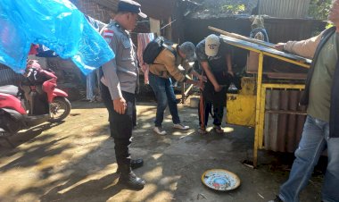 Bhabinkamtibmas-Kelurahan-Lawir-Bersama-Tim-Laksanakan-Vaksinasi-HPR-untuk-Tekan-Risiko-Rabies-di-Wilayah-Binaan