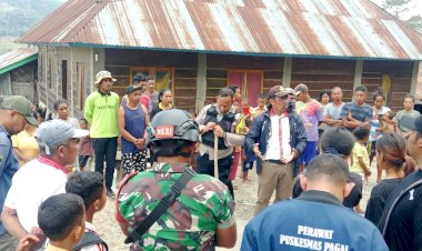 Bhabinkamtibmas-Polsek-Cibal-Dampingi-Tim-Kecamatan-dan-Pemerintah-Desa-Rado-Tangani-Hewan-Penular-Rabies
