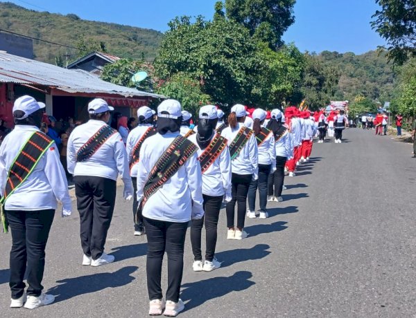 MERIAHKAN HUT KEMERDEKAAN RI KE-81, POLSEK REO DUKUNG SEMARAK LOMBA GERAK JALAN INDAH TINGKAT KECAMATAN REOK