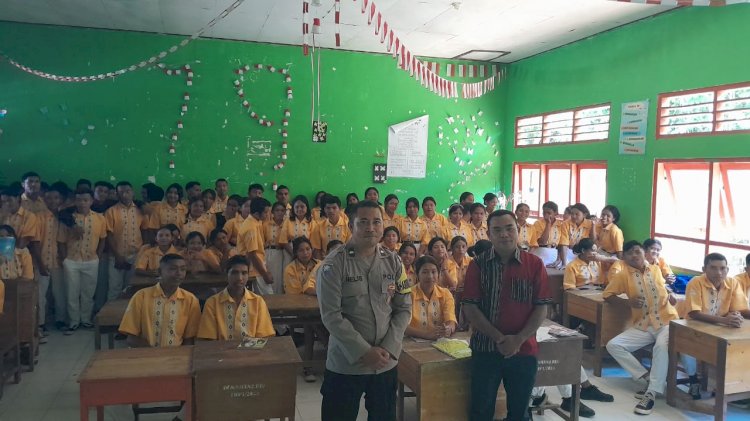 Bhabinkamtibmas Laksanakan Giat Sambang dan Sosialisasi Penerimaan POLRI 2025 di SMAN 2 Rahong Utara