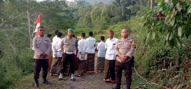 POLSEK CIBAL DAN BHABINKAMTIBMAS LAKSANAKAN PENGAMANAN DAN PENGAWALAN PERARAKAN PATUNG BUNDA MARIA DI KELURAHAN PAGAL