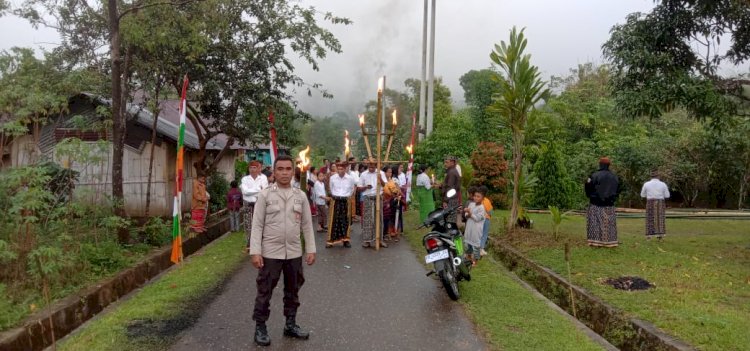 Polsek Cibal Kawal Perarakan Patung Bunda Maria dengan Aman dan Tertib