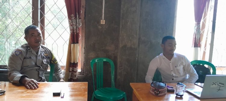 Bhabinkamtibmas Rahong Utara Sambangi Kantor Desa Benteng Tubi, Tingkatkan Koordinasi Dan Edukasi Kamtibmas