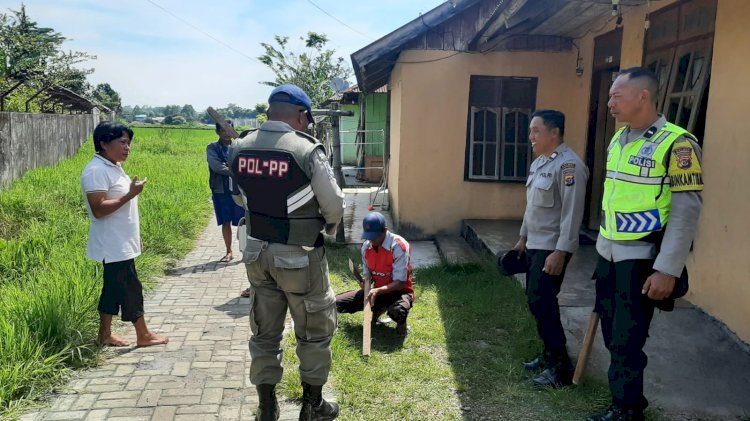 BHABINKAMTIBMAS SE-KECAMATAN LANGKE REMBONG LAKSANAKAN HIMBAUAN DAN ELIMINASI HEWAN PENULAR RABIES DI MBAUMUKU