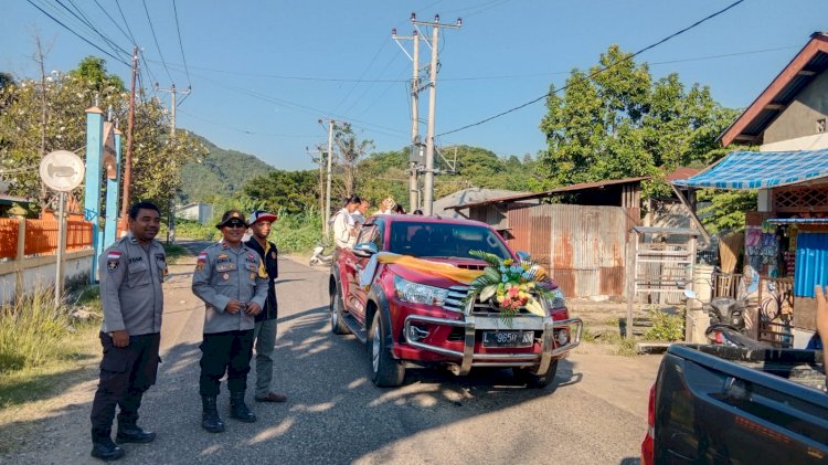POLSEK REO LAKSANAKAN PENGAWALAN DAN PENGAMANAN PROSESI SAKRAMEN MAHA KUDUS CORPUS CHRISTI, RATUSAN UMAT KATOLIK IKUTI PERARAKAN DENGAN KHIDMAT