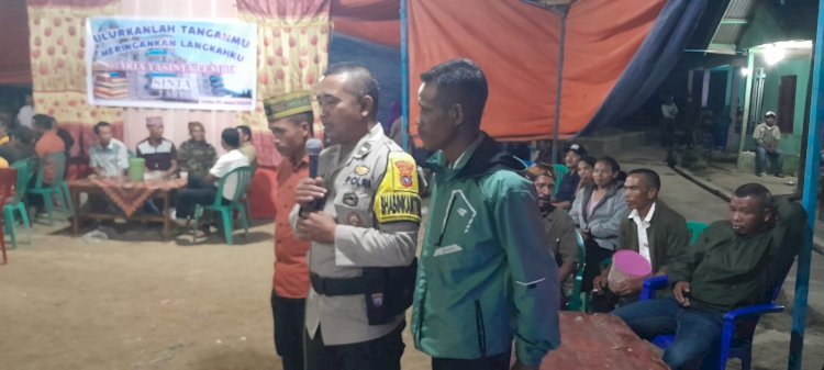 BHABINKAMTIBMAS POLRES MANGGARAI HADIRI DAN PANTAU PESTA SEKOLAH DI KAMPUNG TEBO, WUJUDKAN SITUASI KAMTIBMAS YANG AMAN DAN KONDUSIF