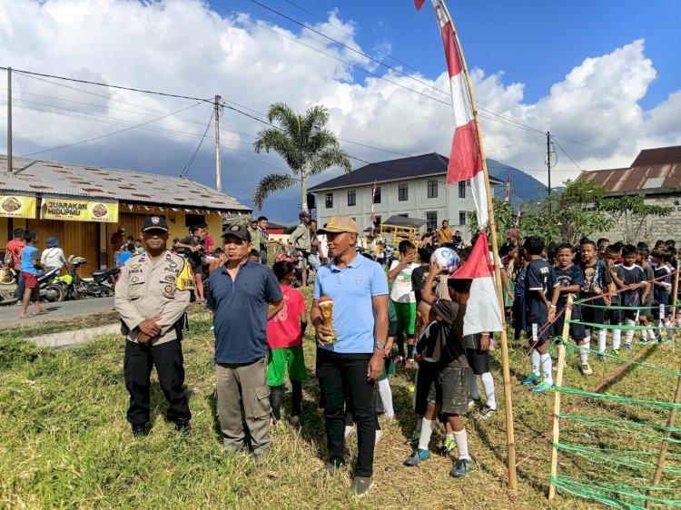 Semarak HUT RI ke-81, Bhabinkamtibmas Kelurahan Wali Amankan Pertandingan Lurah Wali Cup U-9